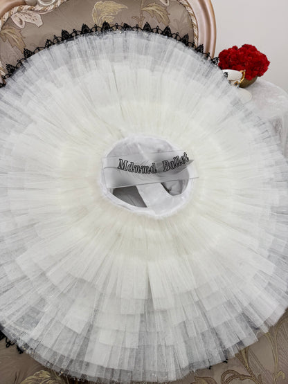 An elegant white ballet tutu adorned with lace and sequin embellishments.-MDT1282
